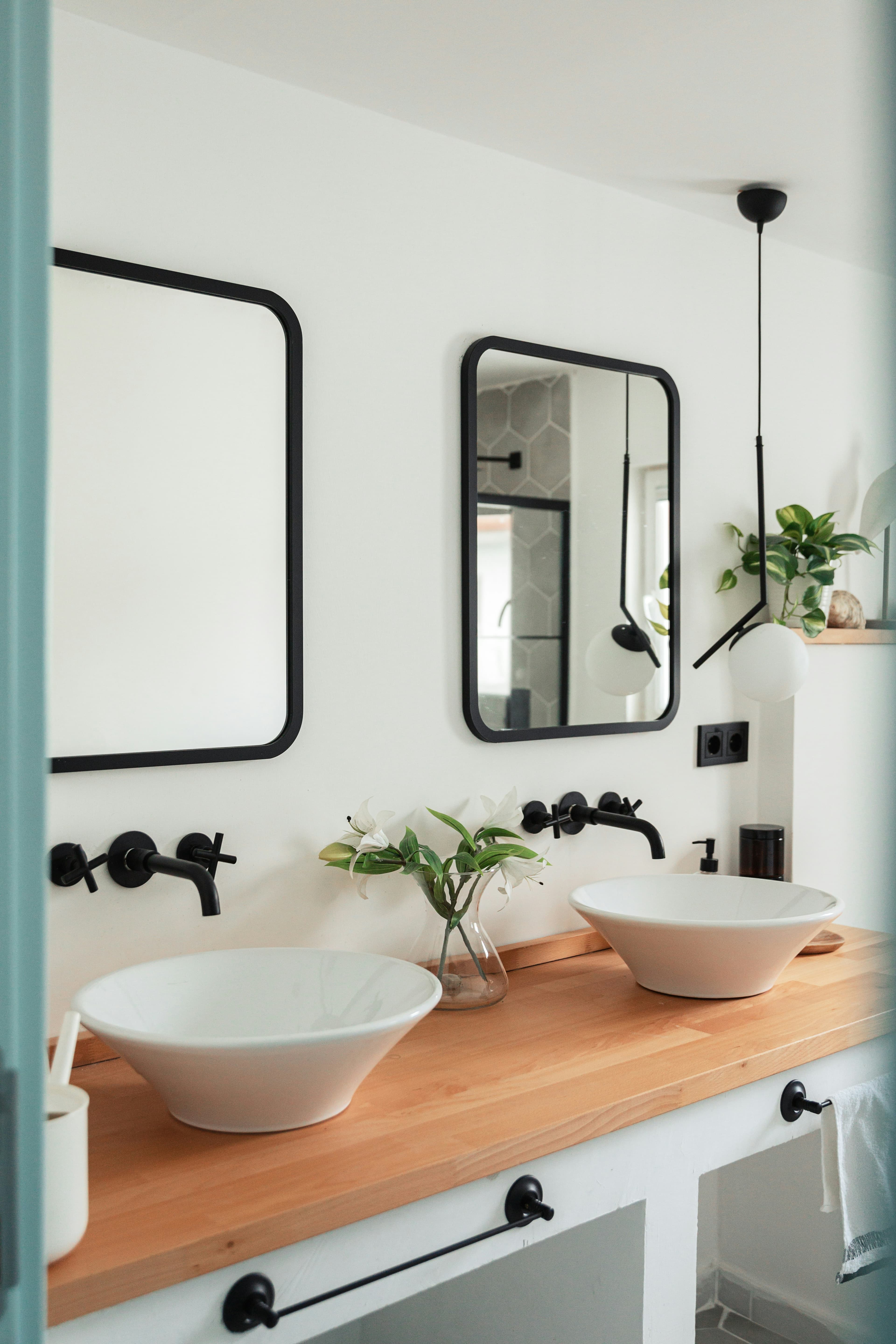 Modern bathroom renovation with walk-in shower and custom vanity in Austin, TX